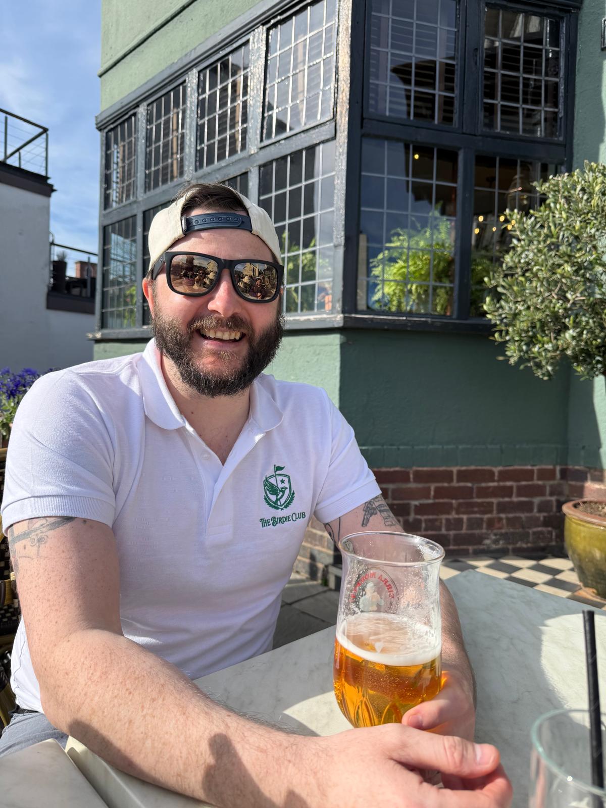 Post-round pint in the sunshine