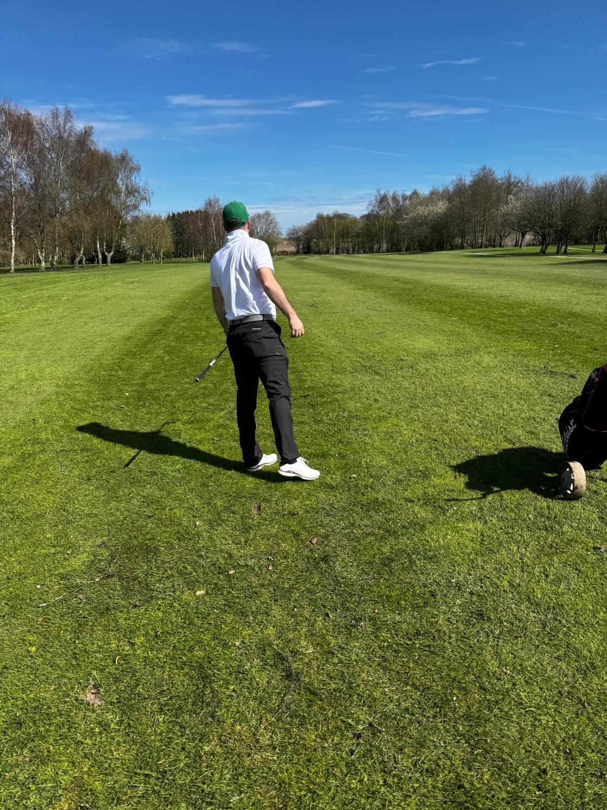 Watching a shot down the fairway